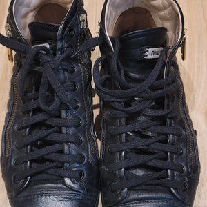 Well loved leather high top sneakers by Miu Miu (Prada)